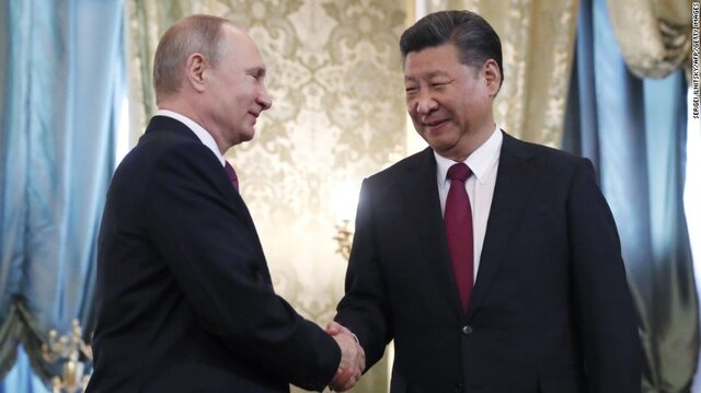 چرا پوتین در ملاقات با روسای جمهور چین و آرژانتین پروتکل‌های کرونایی را رعایت نکرد؟!